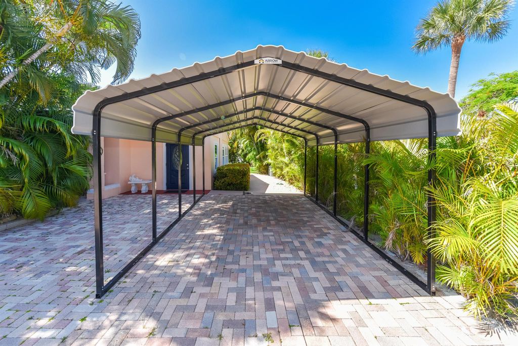 Photo of 1116 NE Oceanview Circle, Jensen Beach, FL 34957 (MLS # R11091511)