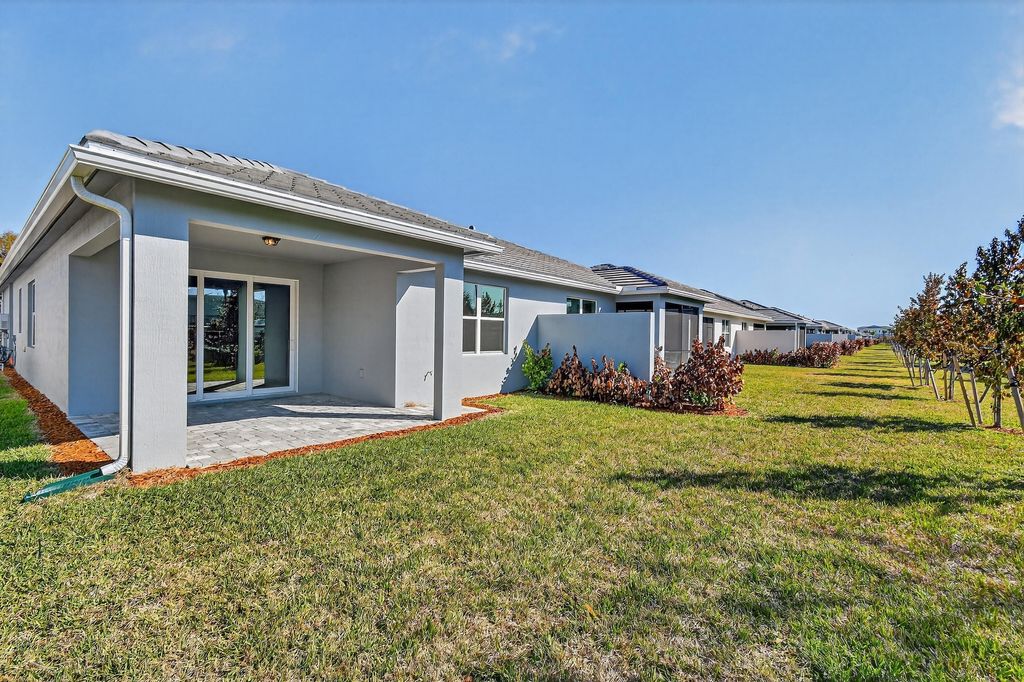 Photo of 1545 Harper Way #Villa 32, Vero Beach, FL 32960 (MLS # R11149583)