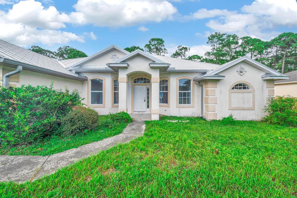 Photo of 1814 SW Hickock Terrace, Port Saint Lucie, FL 34953 (MLS # R11019999)