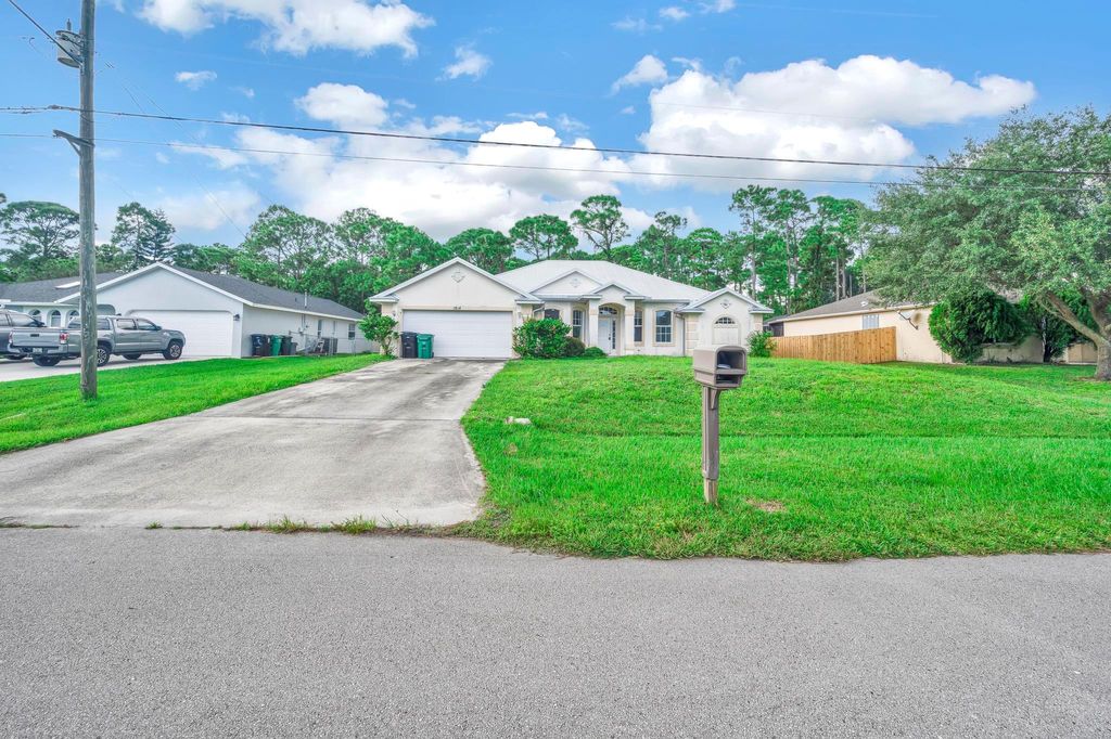 Photo of 1814 SW Hickock Terrace, Port Saint Lucie, FL 34953 (MLS # R11019999)