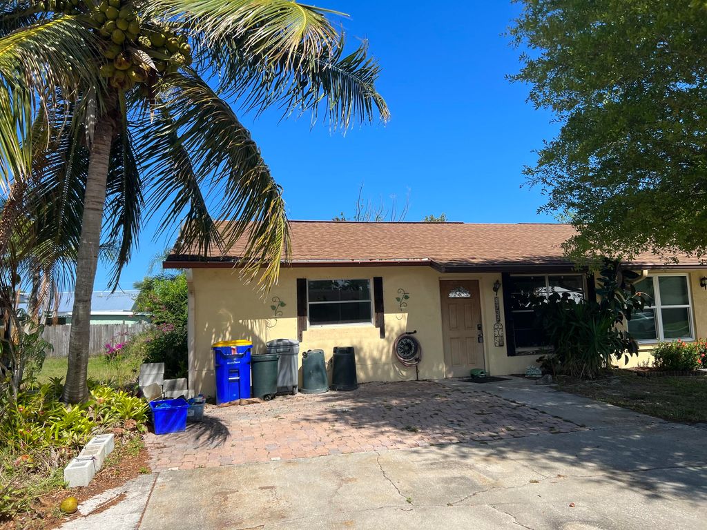 Photo of 8735 SE Sandy Lane, Hobe Sound, FL 33455 (MLS # R10786068)