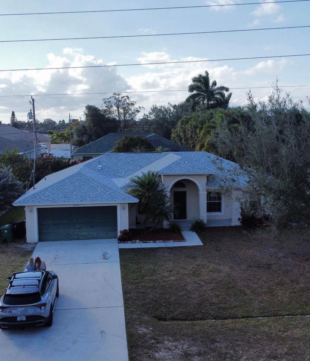 Photo of 4542 SW Savona Boulevard, Port Saint Lucie, FL 34953 (MLS # R11159659)