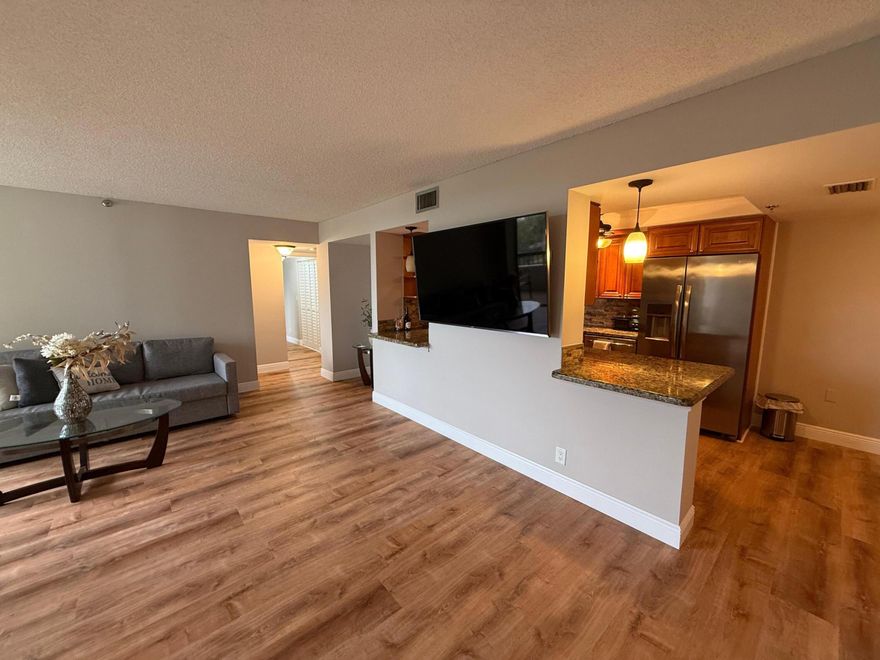 Beautifully renovated 2-bdrm, 2-bth condo with 1,388 sq ft under air, located in the highly desirable Boca Del Mar area of Boca Raton. This light-filled residence features a spacious open layout with dramatic floor-to-ceiling windows & sliding glass doors that open to a large wrap-around covered patio, accessible from the living room & both bedrooms--perfect for enjoying beautiful sunset views.  The updated kitchen offers wood cabinetry with deep drawers & a lazy Susan, granite countertops, stone backsplash, recessed lighting, a snack bar, & stainless steel appliances, including a brand-new refrigerator. A cozy eat-in area adds to the functionality of the space. The primary suite features a large walk-in closet & an updated bathroom, while the second bedroom and bath are renovated. Additional highlights include a brand-new A/C (2024) and a full-size in-unit laundry room. Located in La Costa Del Mar, a boutique building with secure touch-less entry, interior hallways, elevators, a stylish lobby, two pools, and two hot tubs.

Prime location just minutes from Town Center at Boca Raton, Mizner Park, shopping, dining, top-rated schools, and the beach. Rent right away (6-month minimum)--great for investors. Pets up to 30 lbs allowed. Includes 1 assigned parking space and 1 guest spot.