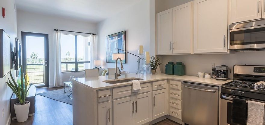 312 Northwood defines urban contemporary cool. This is the Austin 1/1 Floor Plan with west View.   One and two bedroom apartments sized and appointed for living — amazing units with plank floors throughout, oversized windows and 10 foot ceilings. Light, bright, and airy. Stainless steel appliances, a gas range, and custom shaker cabinets mean you can actually enjoy an apartment kitchen. Master baths with large soaking tubs and full tile shower stalls in two bedroom units. Walk-in closets in every bedroom and large terrace that are actually useful for sitting, sunning or eating. Every unit has a front loading stacked washer and a gas dryer so your clothes dry faster. Garbage chutes on every floor mean no messy trash outside your door. You might not want to leave.