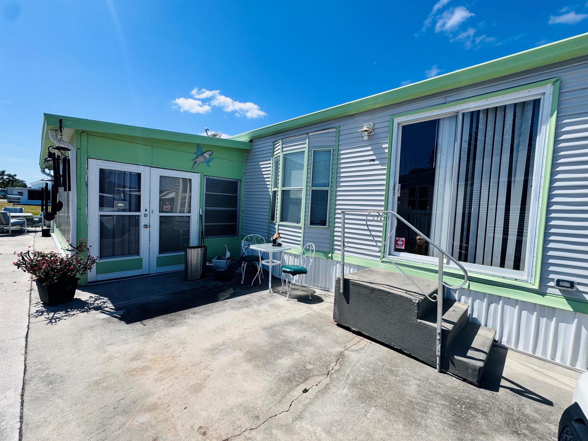 WATERFRONT with Lake Access, 55+ Community with all the perks! This well kept home features 2 bedrooms and 1 bathroom, shed with electric and a private dock right in your backyard that leads to Lake Okeechobee. Located in Blue Cypress Golf & RV Resort, this beautiful community has a pool, clubhouse, golf course, pickle ball and many other activities.