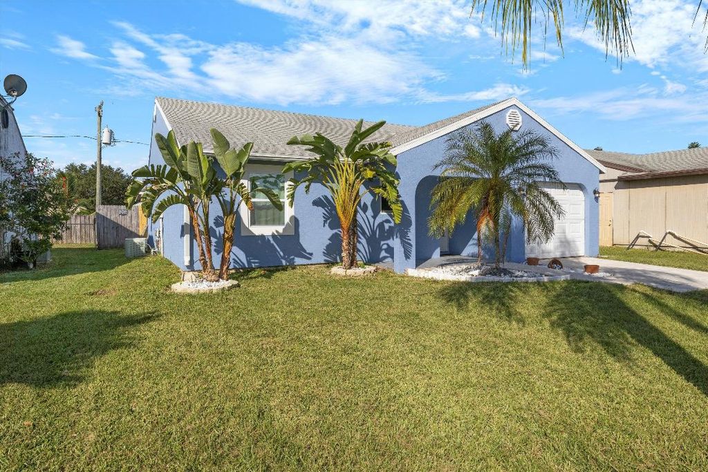 Photo of 5878 SE Mitzi Lane, Stuart, FL 34997 (MLS # R10932532)