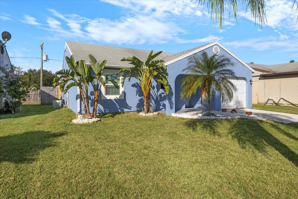 Photo of 5878 SE Mitzi Lane, Stuart, FL 34997 (MLS # R10932532)