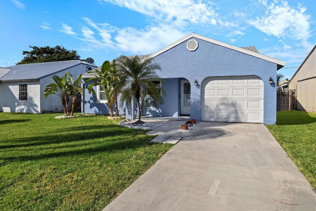 Photo of 5878 SE Mitzi Lane, Stuart, FL 34997 (MLS # R10932532)