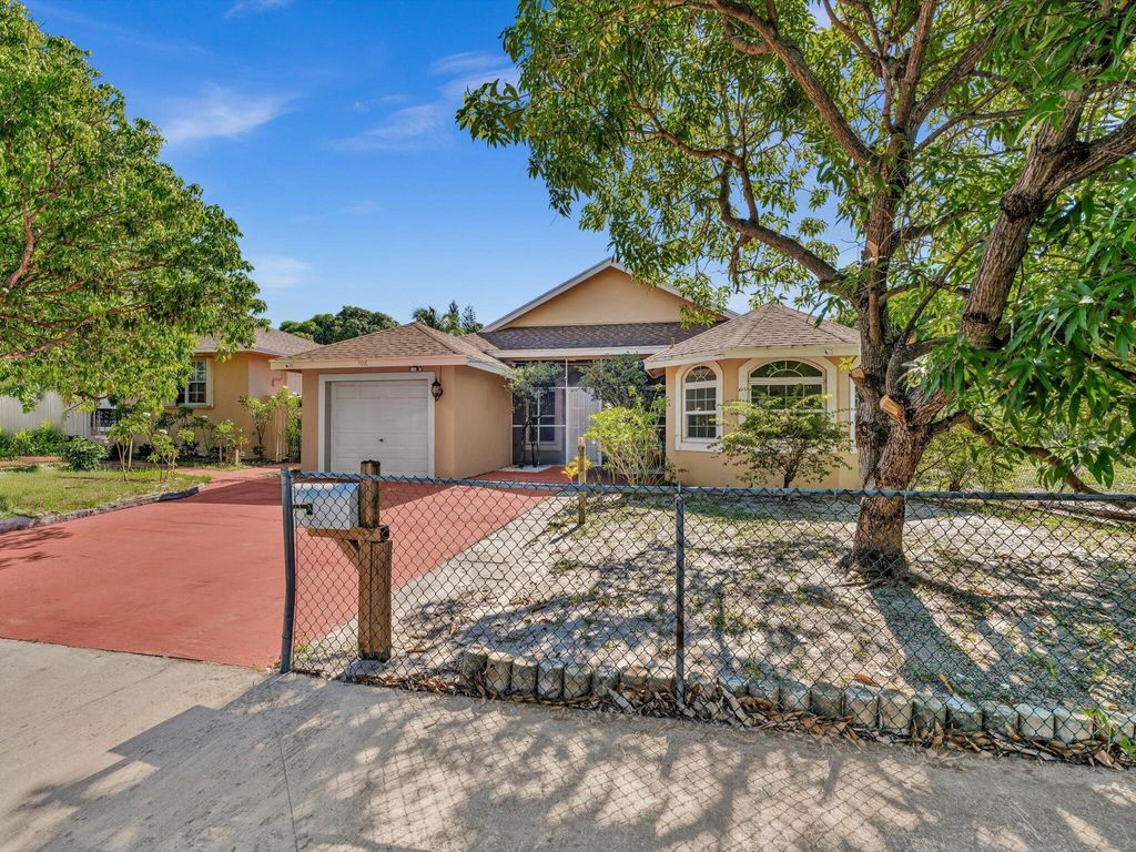 Photo of 706 N C Street, Lake Worth Beach, FL 33460 (MLS # R11116381)