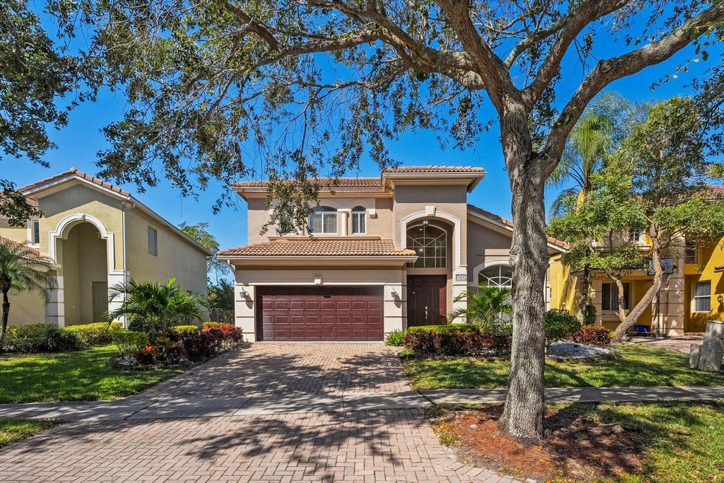 Photo of 709 Gazetta Way, West Palm Beach, FL 33413 (MLS # R10958069)