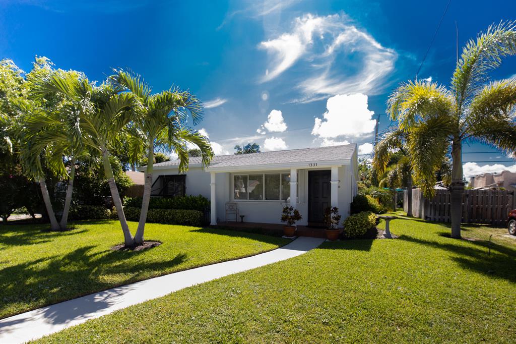Beautiful house, yard and new totally remodeled upgraded custom kitchen w/ Stainless Steel appliances, Granite counter tops and Tumbled marble backsplash. Polished terrazzo floors, new windows, new central A/C and laundry are just some of the other features included. Dining area and Large Living and family rooms. Exterior is freshly landscaped with tropical and fruit plants with private fenced yard. Extra fenced driveway area for your boat, RV or car. Located east of Federal in the highly desired Parrot Cove/Eden Place Neighborhood and close to beach, golf and all the activities of DowntownEnjoy real 360 tour located inside this listing, self paced, room by room, space by space