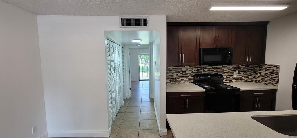 Photo of 1824 Meadows Circle W, Boynton Beach, FL 33436 (MLS # R11115383)