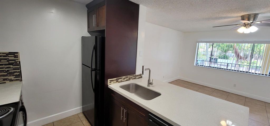 Photo of 1824 Meadows Circle W, Boynton Beach, FL 33436 (MLS # R11115383)