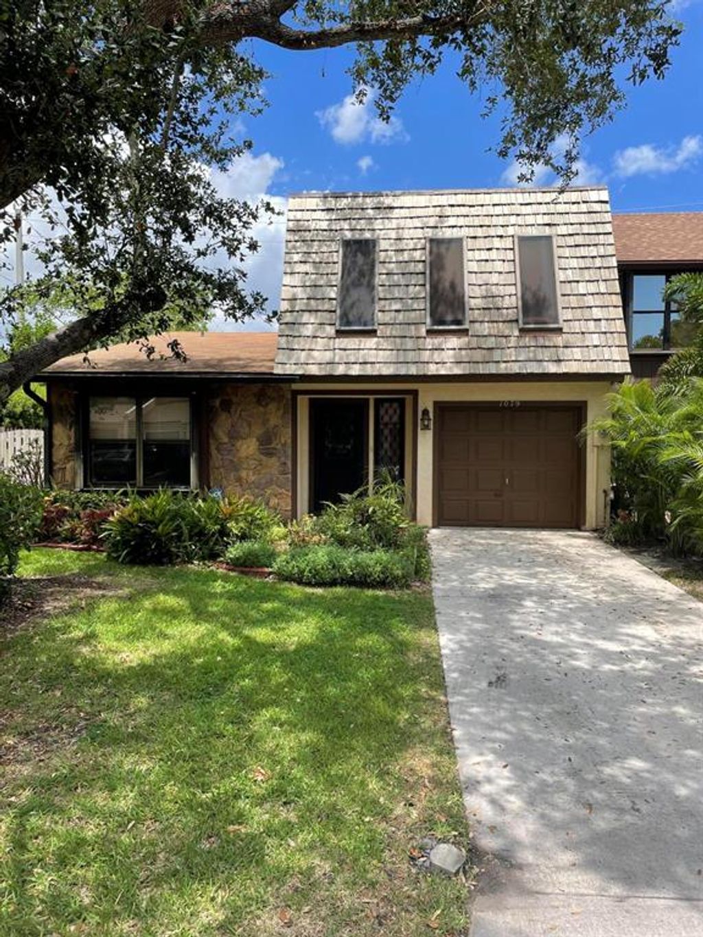 Photo of 1079 Raintree Lane, Palm Beach Gardens, FL 33410 (MLS # R10824894)