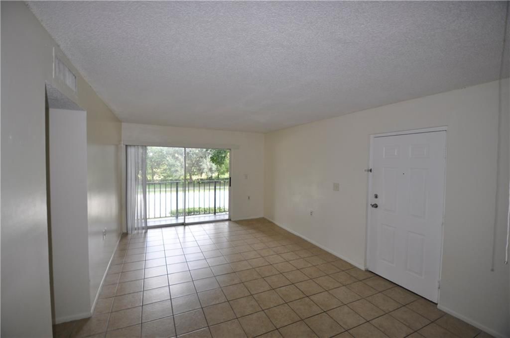 Photo of 1133 N Benoist Farms Rd #206, West Palm Beach, FL 33411 (MLS # F10314630)