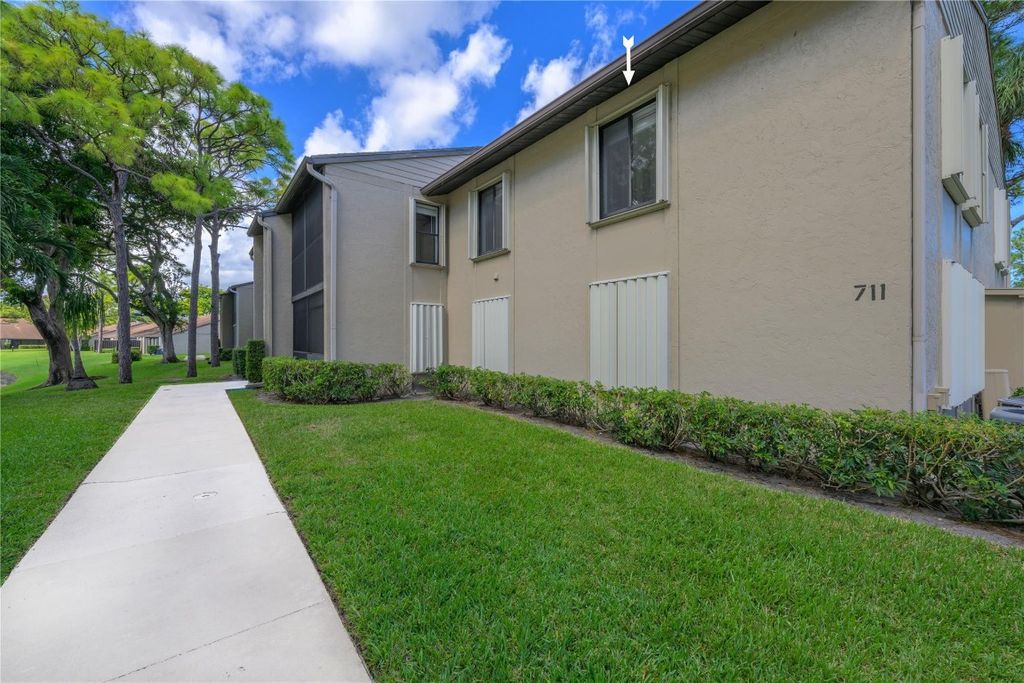Photo of 711 Sunny Pine Way #B-2, Greenacres, FL 33415 (MLS # F10543871)