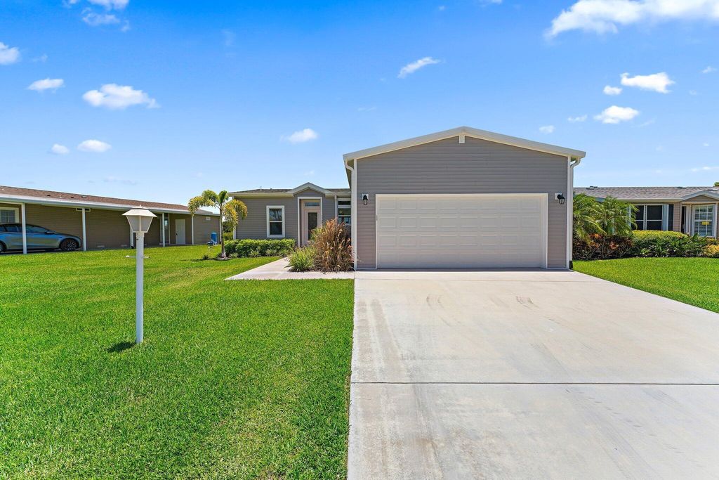 Photo of 7720 Mcclintock Way, Port Saint Lucie, FL 34952 (MLS # R11007647)