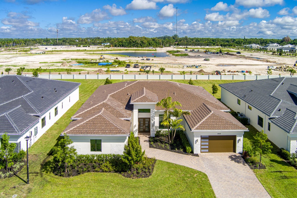 Photo of 10253 CANTER CREEK Court, Lake Worth, FL 33449 (MLS # B26081883)