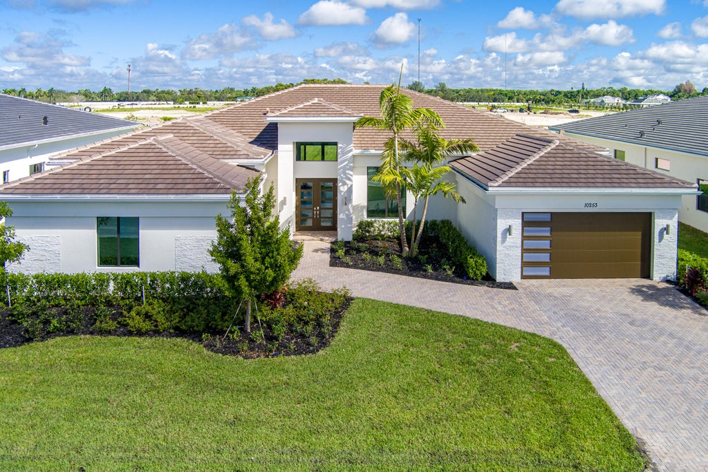 Photo of 10253 CANTER CREEK Court, Lake Worth, FL 33449 (MLS # B26081883)