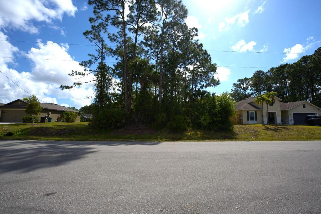 Photo of 3743 SW Ottawa Street, Port Saint Lucie, FL 34953 (MLS # R10983812)