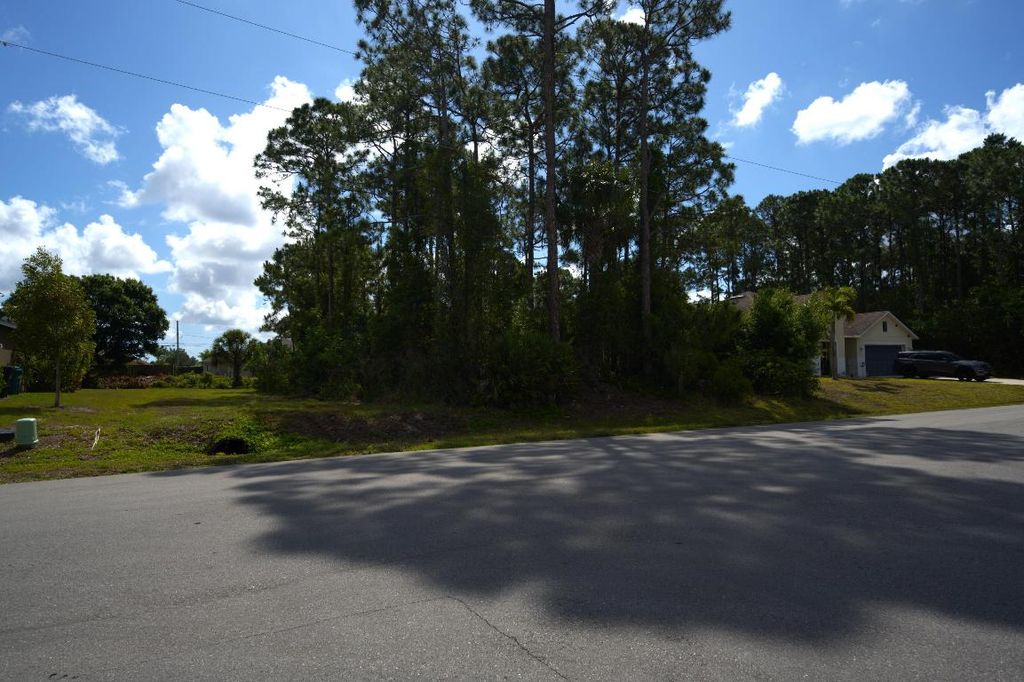 Photo of 3743 SW Ottawa Street, Port Saint Lucie, FL 34953 (MLS # R10983812)