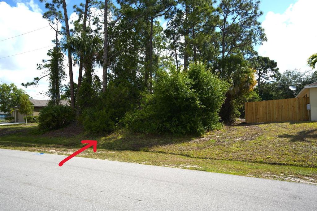 Photo of 3743 SW Ottawa Street, Port Saint Lucie, FL 34953 (MLS # R10983812)