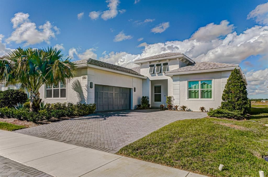Photo of 8740 SW Flutto Way, Port Saint Lucie, FL 34987 (MLS # R10854979)