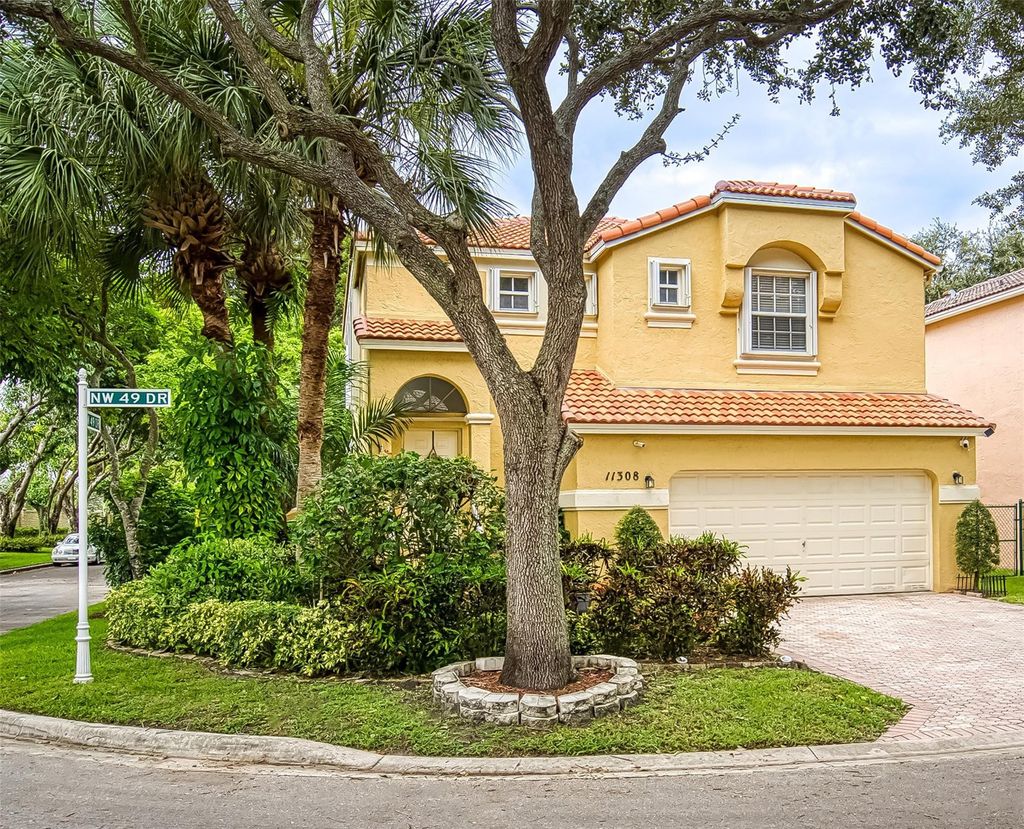 Photo of 11308 NW 49th Drive, Coral Springs, FL 33076 (MLS # F10466547)