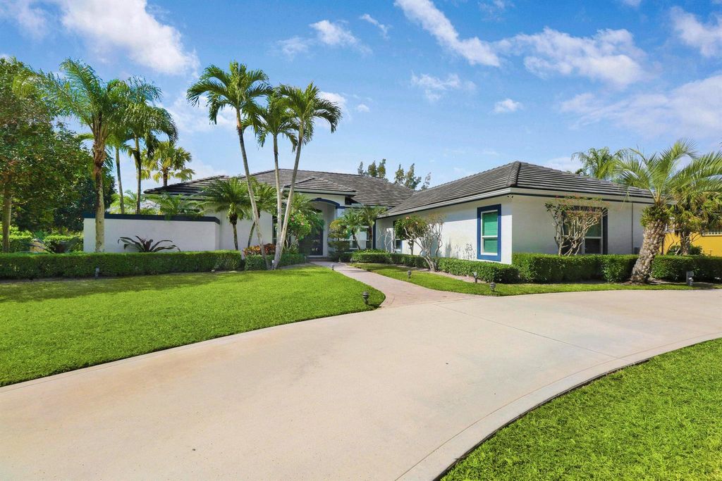 Photo of 8369 Man O War Road, Palm Beach Gardens, FL 33418 (MLS # R10959264)