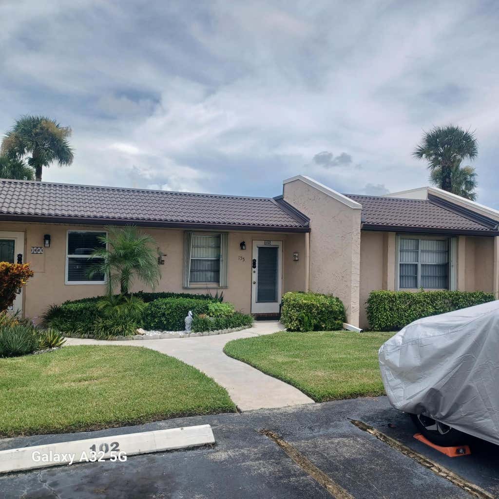 Photo of 155 LAKE MERYL Drive, West Palm Beach, FL 33411 (MLS # B26063999)