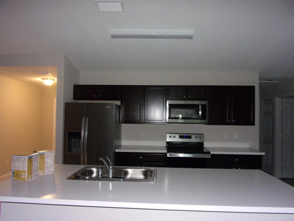 Photo of 1149 SW Ackard Avenue, Port Saint Lucie, FL 34953 (MLS # R11072315)