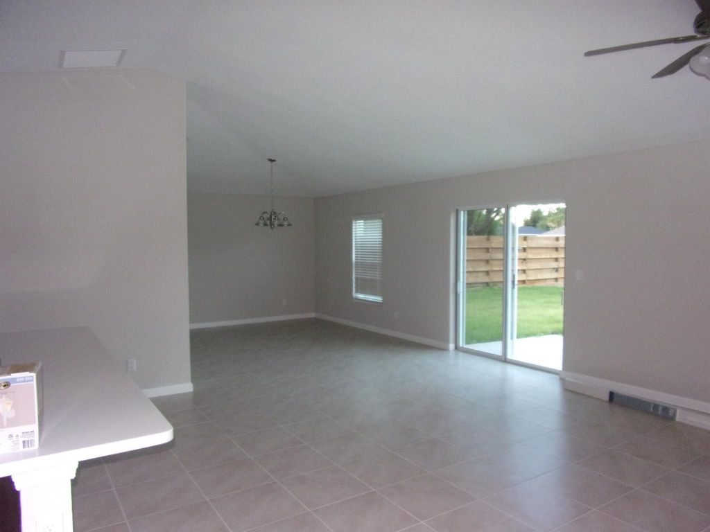 Photo of 1149 SW Ackard Avenue, Port Saint Lucie, FL 34953 (MLS # R11072315)