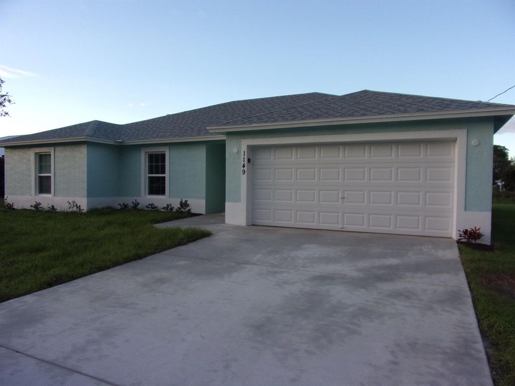 Photo of 1149 SW Ackard Avenue, Port Saint Lucie, FL 34953 (MLS # R11072315)