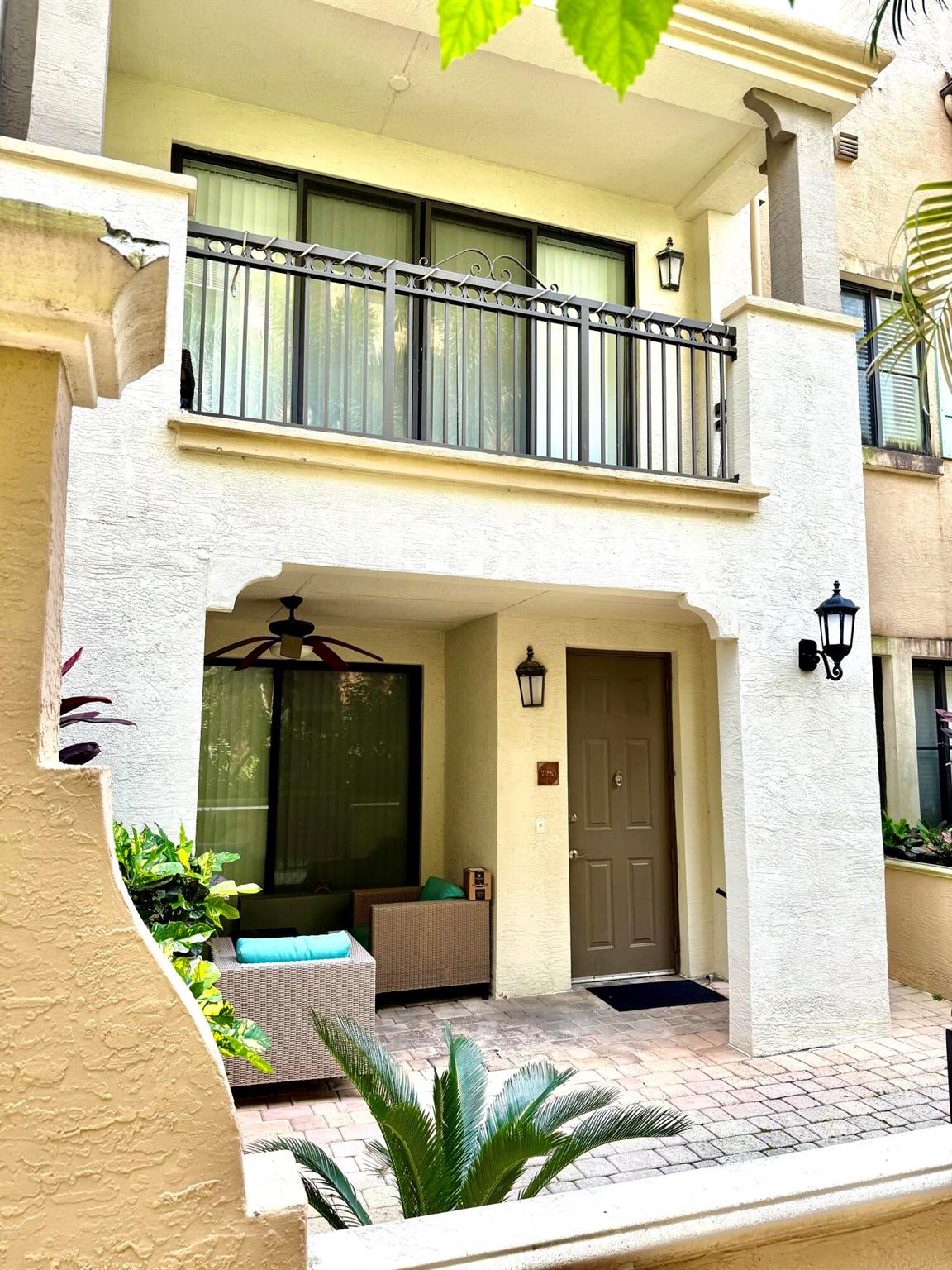Luxury Living in Artesia's Resort-Style Community! This beautiful 2-bedroom, 2.5-bath townhome combines comfort and elegance. Enter on the first floor to find a spacious layout with an open-concept kitchen featuring granite countertops, stainless steel appliances, and abundant cabinet space. Upstairs, the primary suite offers a private balcony, a walk-in closet, a soaking tub, and a separate shower, while the second bedroom ensures privacy and versatility. Ideally located near Sawgrass Mills Mall, Amerant Bank Arena, and major highways, this home also comes with a convenient 2-car garage just steps from the back entrance. Residents enjoy