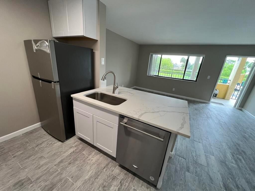 Photo of 1432 Meadows Circle W, Boynton Beach, FL 33436 (MLS # R11091335)