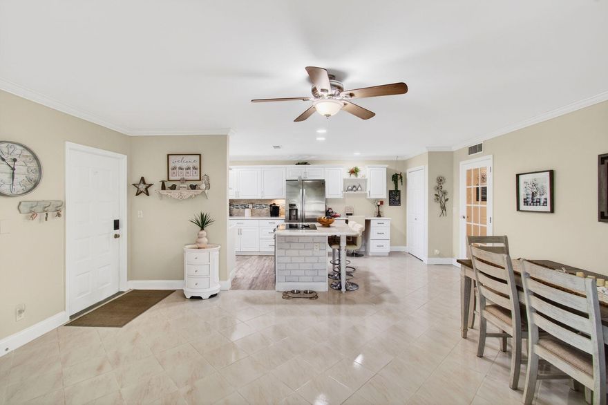 Pride of ownership is evident the moment you step into this highly sought-after, updated, bright and spacious 2BR/2BA corner villa -- the desirable Florida Model - nestled in a vibrant 55+ community. This beautifully maintained home features a new roof (2019), water heater (2019), and AC handler (05/2023) for added peace of mind. The leveled flooring flows throughout with neutral tile and laminate finishes, smooth ceilings (no popcorn), and elegant crown molding. The remodeled open-concept kitchen is a true highlight, showcasing:
Updated cabinetry. Marble tile countertops, Decorative backsplash with under-mount lighting, Modern appliances, High-hat lighting, Large custom pantry, Built-in desk area.
Enjoy added living space in the enclosed Florida room under air, complete with French door for privacy. Additional features include awning shutters and a stacked full-size washer and dryer conveniently located inside the primary closet. Both the guest and primary bathrooms have been tastefully updated. The villa is offered turnkey, with upgraded furnishings--just bring your clothes and toothbrush!
Experience Florida living at its finest in this active 55+ community offering: Large heated resort-style pool, Expansive clubhouse, 
Tennis & pickleball courts, Shuffleboard, Numerous planned social activities, ideally located just minutes from the beach, shopping, dining, theaters, major highways (I-95 & Turnpike), and places of worship.
**All information is deemed reliable but not guaranteed and subject to change without notice.**