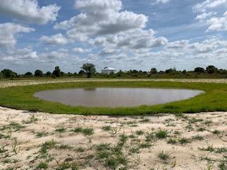 Welcome to the best land Okeechobee has to offer. This amazing 1.33 acre cleared corner lot has a driveway, pond and lots of room for your dream house, RV, boat and other toys. Come live the quiet county life.