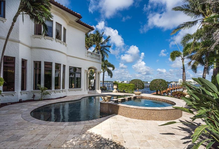 Enjoy spectacular sunsets over the water from this magnificent custom built estate on the desirable north end of Hypoluxo Island.

With cathedral ceilings, a dramatic spiral staircase, elevator, home-theatre, stone fireplace, Viking kitchen, and 2 wet bars, this home is perfect to entertain. 

Outstanding views of the intracoastal from all living areas, a second story walkway overlooking the living areas, a formal dining room, a family room, first floor office and ensuite bedrooms. 

Your patio, outdoor kitchen & pool are just steps away from the wide intracoastal waterway and your 'no-wake' deep water dock that will accommodate a large boat and offers nearby access to the ocean. 

You can also take comfort even in the worst weather with 45KW whole-home generator & impact glass thr Enjoy the spectacular sunsets from this luxurious mediterranean style home on the secluded north end of Hypoluxo Island! 

This open floor plan includes a formal living room with cathedral ceilings, a dramatic spiral staircase, an elevator, a fabulous home-theatre, stone fireplace, morning kitchen,
French doors, and 2 wet bars. The large gourmet kitchen includes Viking appliances, a chef's grade gas stove, a full-size wine refrigerator and a large butler's pantry. You'll find gorgeous finishing touches throughout the entire home like slate tile, glass sinks, bronze hardware and brass & iron scrollwork. 

You have outstanding views of the intracoastal from all living areas, a second story walkway overlooking the living areas, a formal dining room, a family room, first floor office and ensuite bedrooms. The master suite features a romantic waterfront balcony, his & her master baths and spacious walk-in closets.

The outdoor patio area is complete with a heated Pebble Tec pool & spa, a cabana bath, and outdoor kitchen. Your patio & pool are just steps away from the wide Intracoastal Waterway and your 'no-wake' deep water dock that will accommodate a large boat and offers nearby access to the ocean. 

You can also take comfort even in the worst weather with 45KW whole-house generator, impact glass throughout!