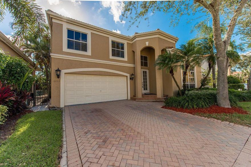 Welcome home Boca Raton's finest community, Woodfield Country Club.  An all age, premier, gated and secured country club located in central Boca Raton's ''A'' rated school zone.  This spacious two story single family home features 3 bedrooms, 2.5 bathrooms + loft,  a 2 car attached garage and pool!  Fully remodeled in 2018 including authentic 7.5'' Du Chateau Touraine style wood floors throughout, premium real wood white shaker kitchen cabinets, mitered edge quartz countertops, top of the line stainless steel appliances, new bathrooms including vanities, showers, flooring and a master bathroom reminiscent of a south beach luxury hotel spa.  The modern yet tranquil color scheme of grey and white will embrace you as you enter the open kitchen with pool and fresh lush landscaping views.  Home also features LED lighting, Decora switches and outlets, Hansgroehe faucets, Marquee paint, Eco friendly & green home Nest home camera doorbell & thermostat system, Halifax door handles and premium everything imaginable!  If you want country club living at its finest, this home is a great place to start!  
Expected completion date of August 1st 2018. No access until completed.
AC 2014 install -Handler and condenser. Hot water tank 2014 install. Furniture not included in the sale of this home.