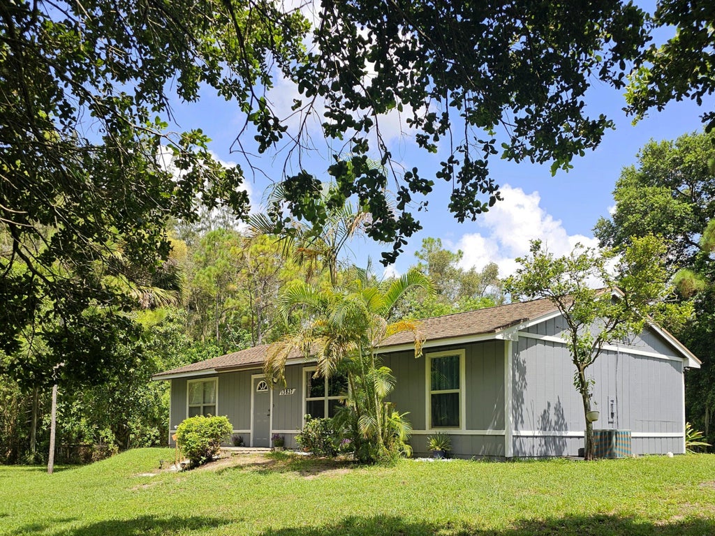 Photo of 13827 63rd Lane N, The Acreage, FL 33412 (MLS # R11007545)
