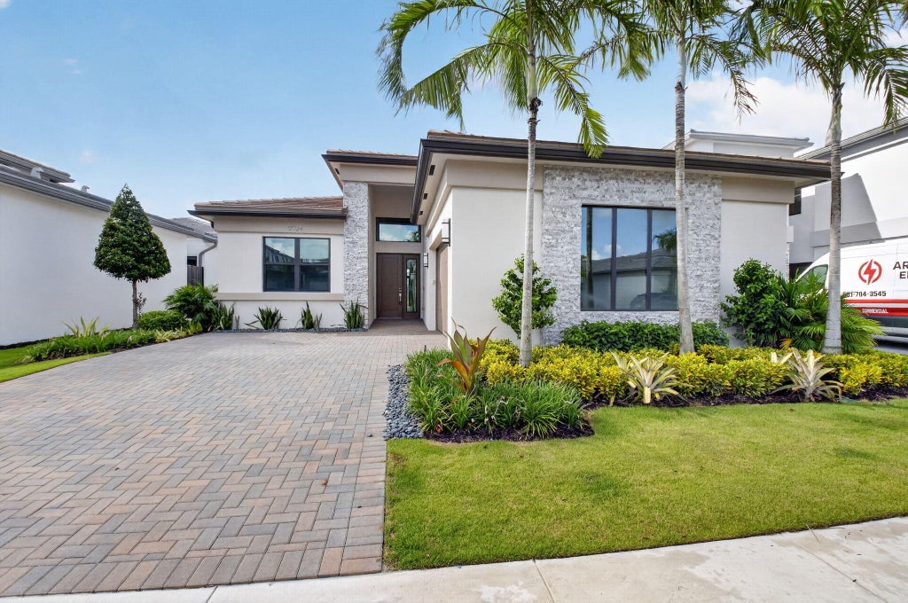 Photo of 9724 JUNIPER BAY Avenue, Boca Raton, FL 33434 (MLS # B26070047)