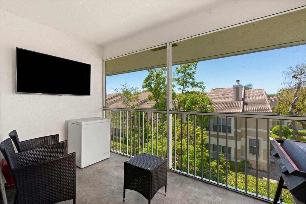 Photo of 2960 Riverside Drive #319-2, Coral Springs, FL 33065 (MLS # F10504297)