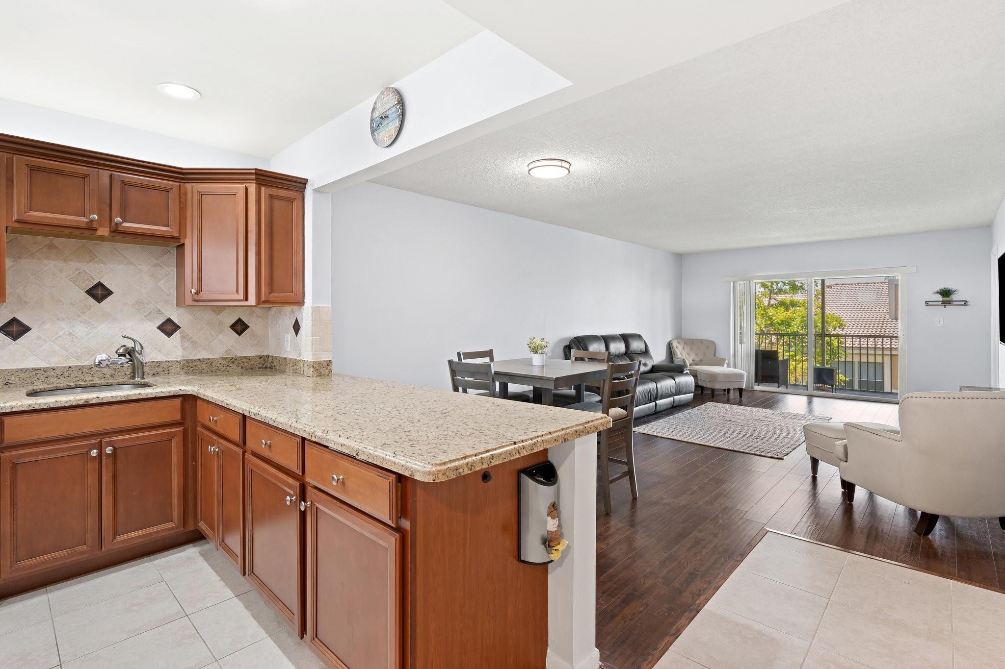 Spacious Fully Updated 2/2 Condo Furnished and Move-In Ready! Featuring Washer/Dryer in Unit, Walk-In Closets in Both Bedrooms and a Large Screened-In Balcony. Open-Concept with just under 1200sq ft Under Air. Community Features a Community Pool and Tennis Courts. Comes with Assigned Parking and Plenty of Guest Parking. Rent Includes Water, Sewer and Trash. Well Located within 5 minutes of The Walk and The Coral Square Mall. 650+ Credit Score Required. Easy to Show.