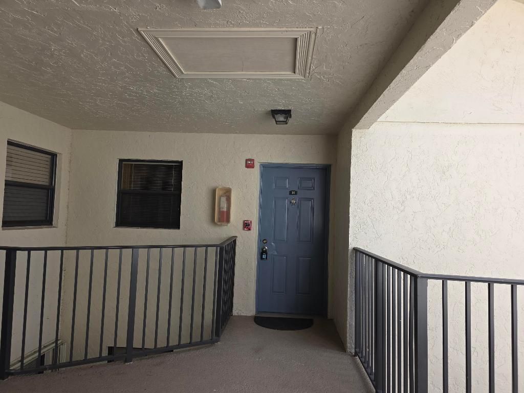 Photo of 1542 Lake Crystal Drive #H, West Palm Beach, FL 33411 (MLS # R11153004)