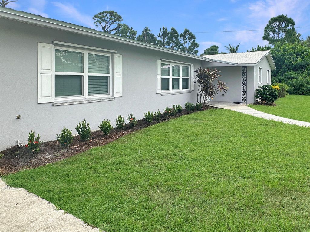 Photo of 5407 Turnpike Feeder Road, Fort Pierce, FL 34951 (MLS # R11125867)