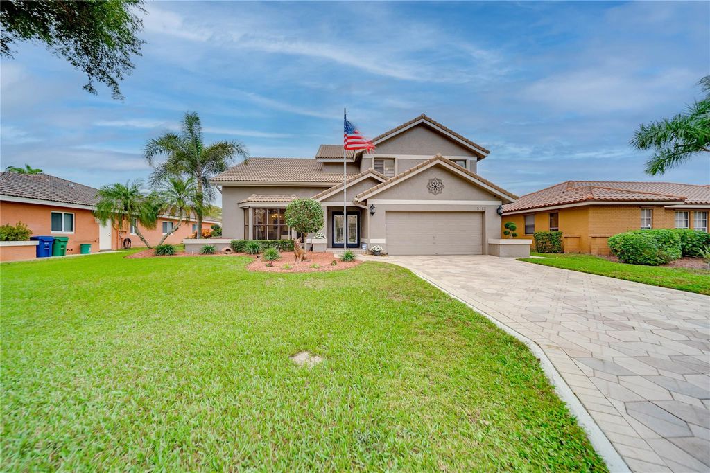 Photo of 5112 NW 58th Terrace, Coral Springs, FL 33067 (MLS # F10417402)