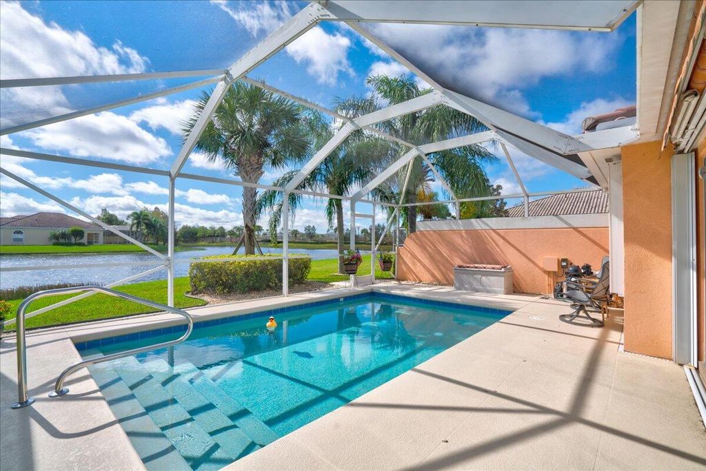 Photo of 10652 SW Hartwick Drive, Port Saint Lucie, FL 34987 (MLS # R10937456)