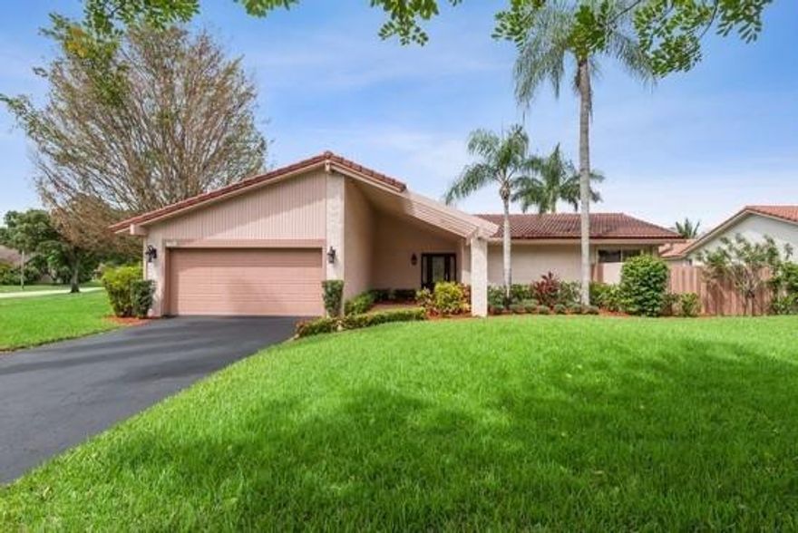 REDUCED! DON'T MISS THIS FABULOUS 4/2 HOME ON A 14,712 SQ. FT LAKEFRONT, CORNER LOT IN HIGHLY SOUGHT AFTER JACARANDA LAKES-PRIVACY AT ITS BEST! PRIDE OF OWNERSHIP SHINES IN THIS IMPECCABLE HOME! BEAUTIFUL OPEN FEEL FROM THE MOMENT YOU ENTER W/ LONG VIEWS OF THE LAKE FROM YOUR FR/KITCHEN/BREAKFAST AREA TO YOUR LR AND PRIMARY BR! RARELY FOUND ARE 2 FIREPLACES-THE 1ST IN THE LR WHILE THE 2ND IS IN THE PRIMARY BR!VAULTED CEILING IN LR W/EXPOSED WOOD BEAMS & WET BAR, UPDATED 2ND BATH W/NO EXPENSE SPARED, UPDATED CHERRY WOOD KITCHEN CABINETS,GRANITE COUNTERS, SS APPL,& CENTER ISLAND. LG BR'S, NEW 5 TON TRANE A/C AS OF 3/19, EXTERIOR ELECTRIC PANEL REPLACED 6/17 & INTERIOR ELECTRIC PANEL REPLACED 2/19, ACCORDIAN SHUTTERS INSTALLED 4/19, ROOF REPLACED 8/07. WELL CARED FOR-THIS HOME WILL SELL FAST! 4/2 HOME WITH OPEN FEEL AND BEAUTIFUL VIEWS OF THE LAKE, CORNER PROPERTY WITH ROOM FOR POOL, FENCED ON N. SIDE FOR PRIVACY! ABSOLUTELY IN MOVE-IN CONDITION! AROUND THE CORNER FROM CITY PARK -JACARANDA PARK OFFERING TENNIS OR PICKLEBALL COURTS PLUS TODDLER PLAYGROUND, AND FITNESS TRAIL.