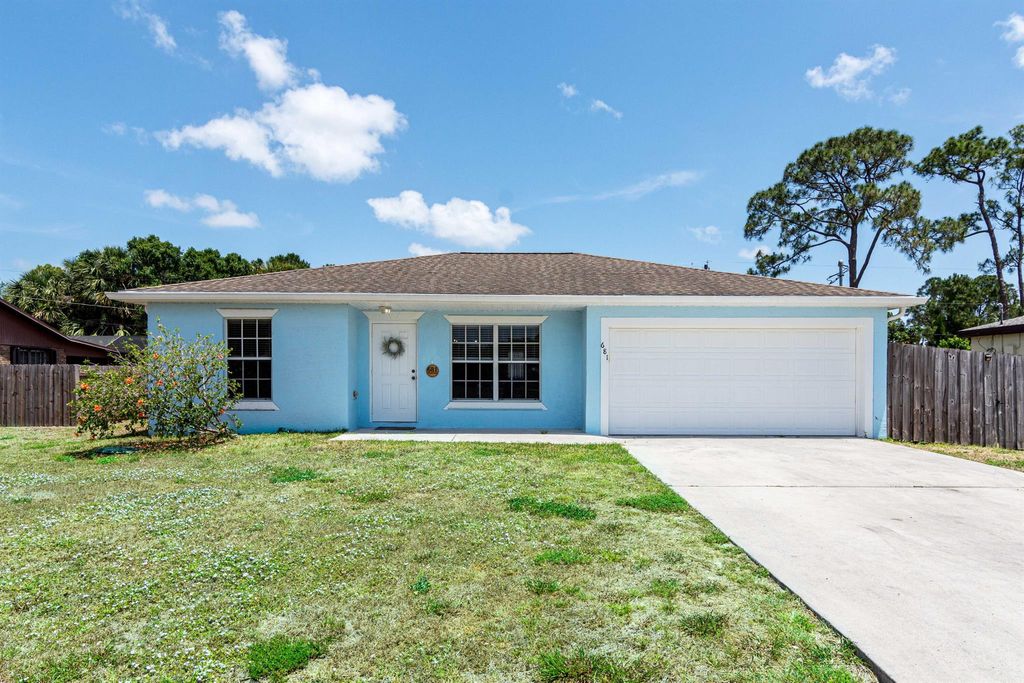 Photo of 681 NW Sharpe Street, Port Saint Lucie, FL 34983 (MLS # R11085028)