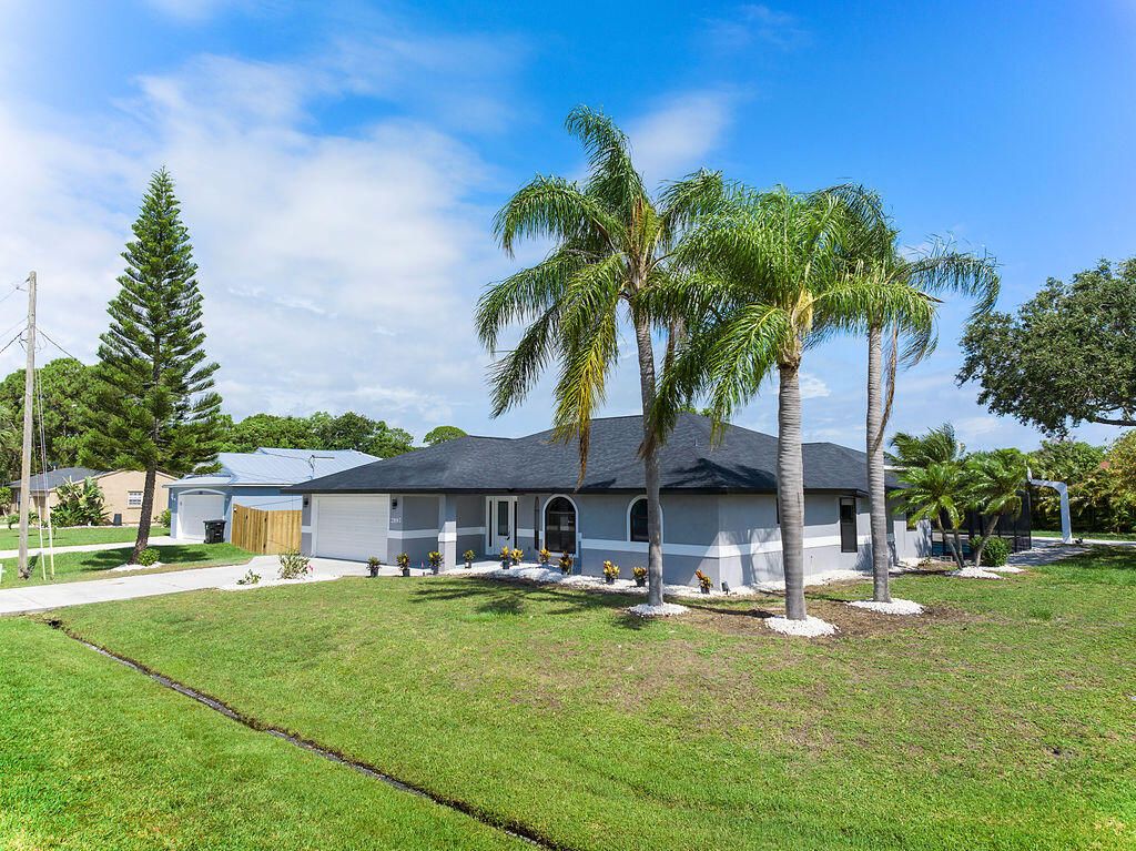 Photo of 2897 SE Cabana Lane, Port Saint Lucie, FL 34952 (MLS # R11018129)
